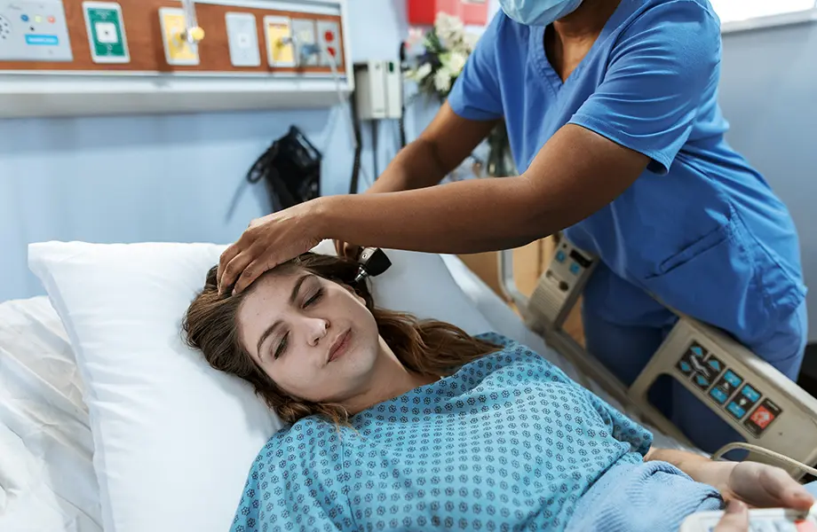 Nurse Examining Patient